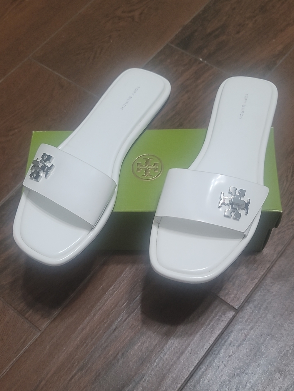 Tory Burch White Patent Logo Slide Sandals with Silver Emblem